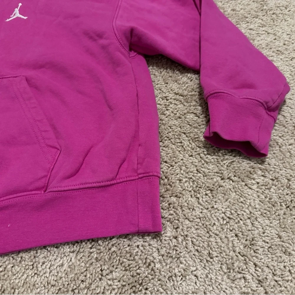 Jordan Big Girls' Brooklyn Essentials Hoodie in a pink/fuchsia color size 12-13